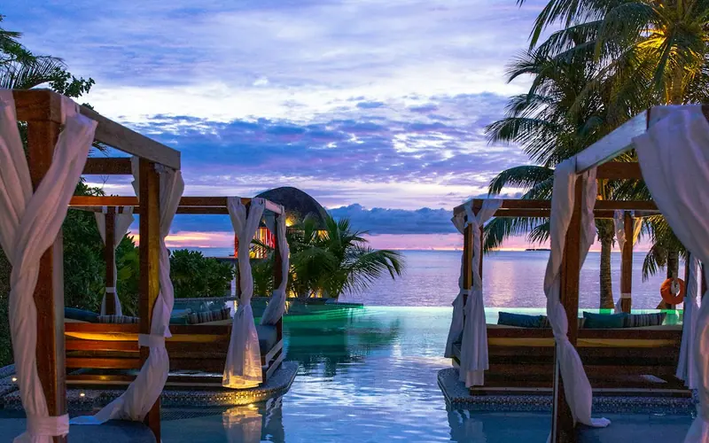 Infinity pool at a resort at dusk